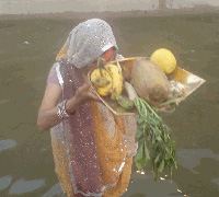 People sing Chhat songs during Chhat Puja